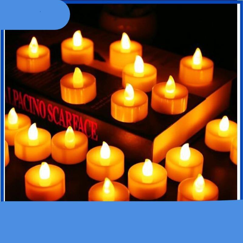 12Pcs flameless LED tea light candles with warm amber glow arranged in display on Tampa Home & Garden Store