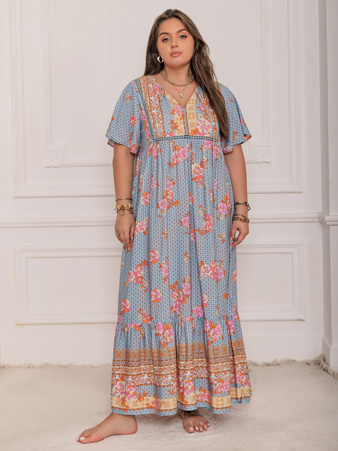 Stevvex plus-size blue floral maxi dress with pink and orange flowers, flutter sleeves on Tampa Home & Garden Store