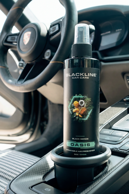 Blackline Car Care 8oz car air freshener with oasis label in vehicle interior on Tampa Home & Garden Store