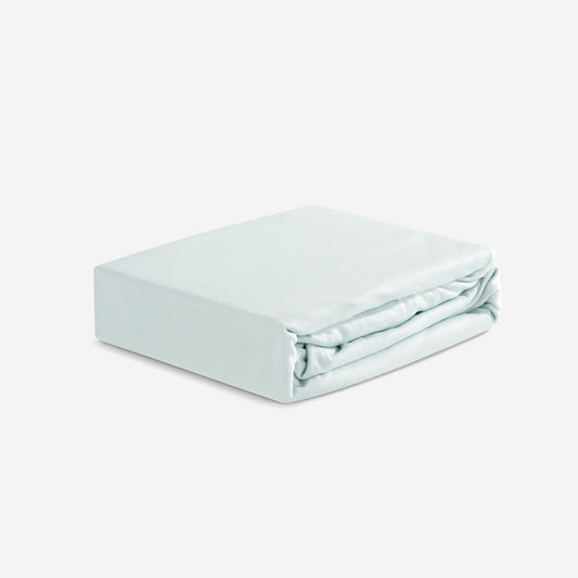 BedGear Dri-Tec Crib Sheet in light green, neatly folded crib bedding on Tampa Home & Garden Store