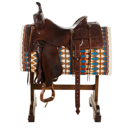 Double Arrow 40x34 NZ Wool Saddle Blanket Mayatex under a brown tooled saddle on Tampa Home & Garden Store
