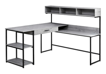 L-shaped corner desk with gray woodgrain top, black metal frame, drawer, and three open cubbies on Tampa Home & Garden Store