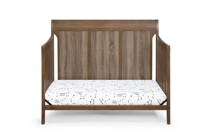 Shailee 4-in-1 Convertible Crib by Unique Piece Furniture in warm brown wood with slatted sides on Tampa Home & Garden Store
