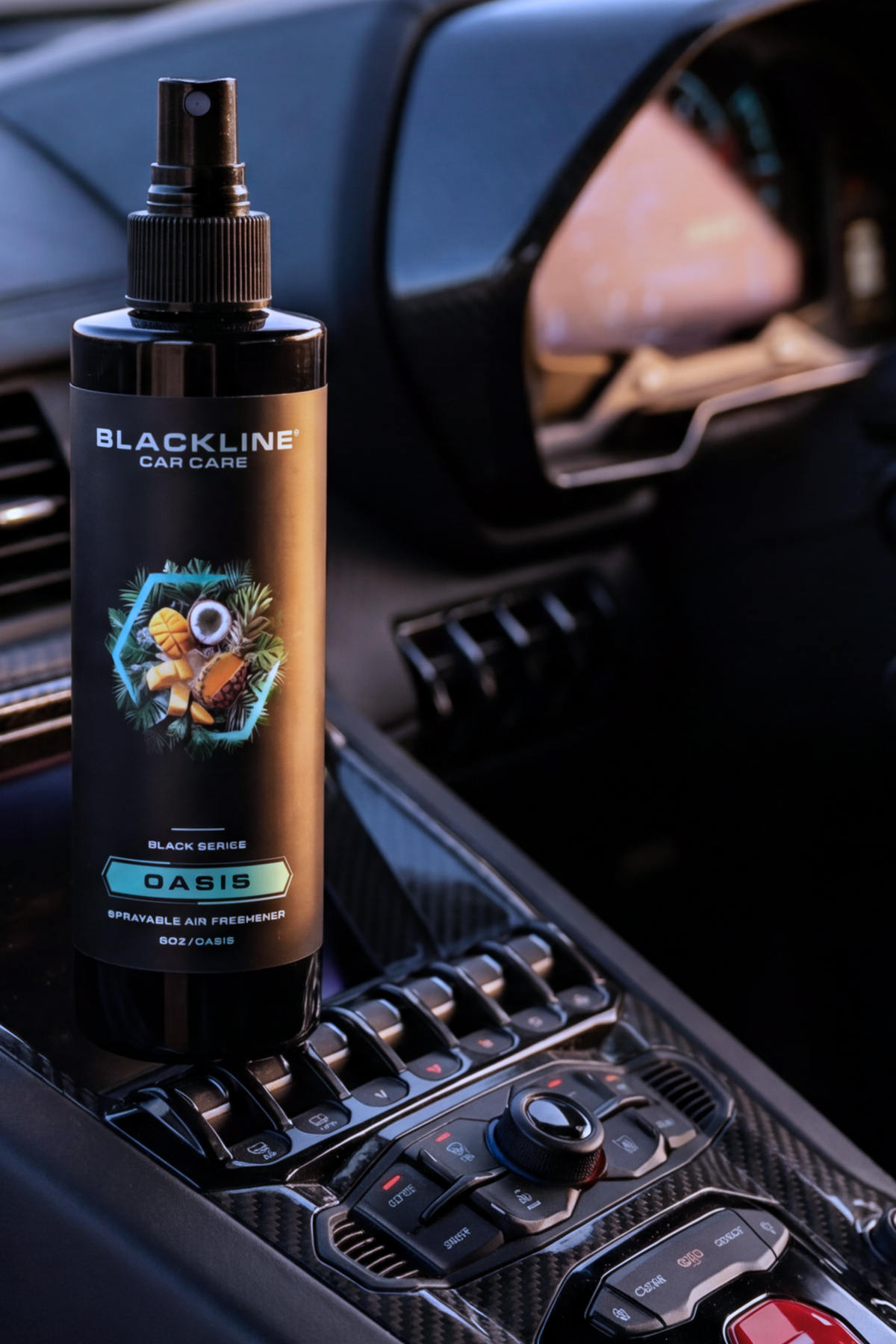 Blackline Car Care 8oz Oasis black car air freshener spray bottle on car dash interior on Tampa Home & Garden Store