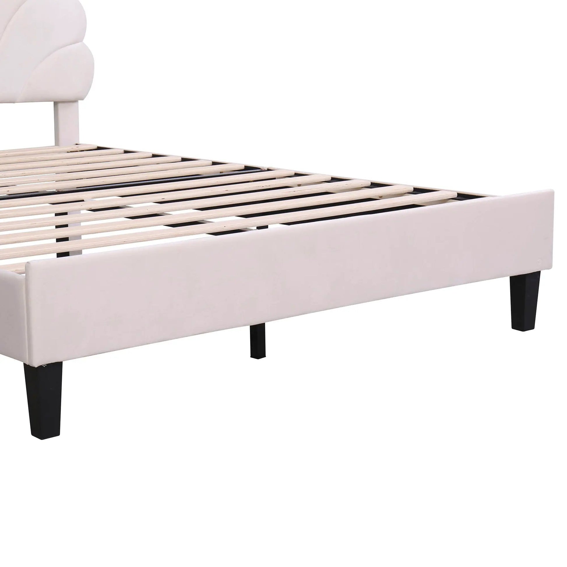 Upholstered platform bed with flower-pattern headboard in cream fabric slatted base black legs on Tampa Home & Garden Store