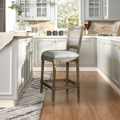 Rattan wicker high-back counter stool with oak frame and gray cushion on Tampa Home & Garden Store