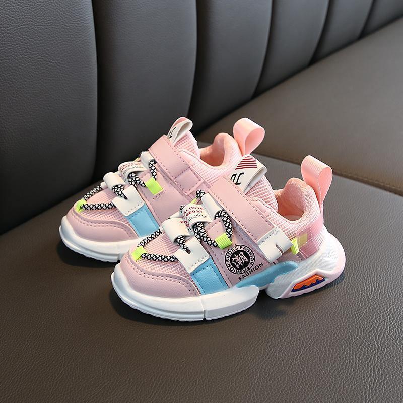 Pair of Stevvex baby and toddler sneakers in pink with blue panels, breathable non-slip sole on Tampa Home & Garden Store