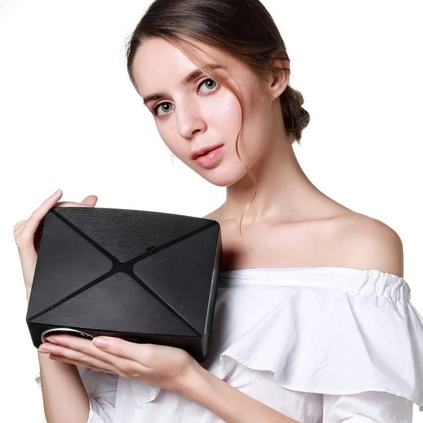 Home desktop projector in black with brushed top texture, My Store projector on Tampa Home & Garden Store