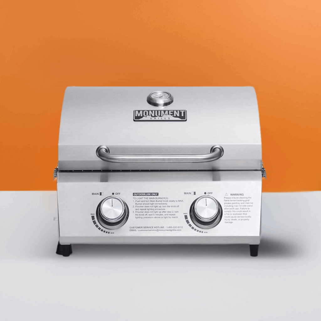 Monument Grills stainless tabletop propane gas grill with front control knobs on Tampa Home & Garden Store