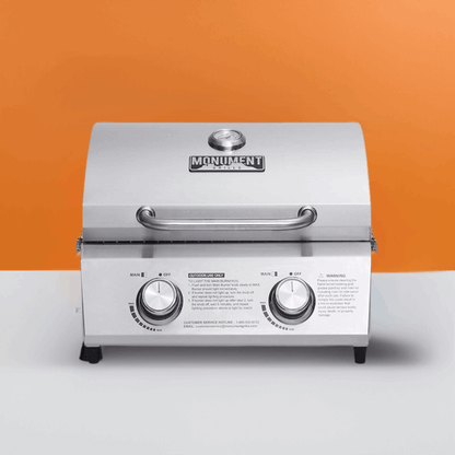 Monument Grills stainless tabletop propane gas grill with front control knobs on Tampa Home & Garden Store