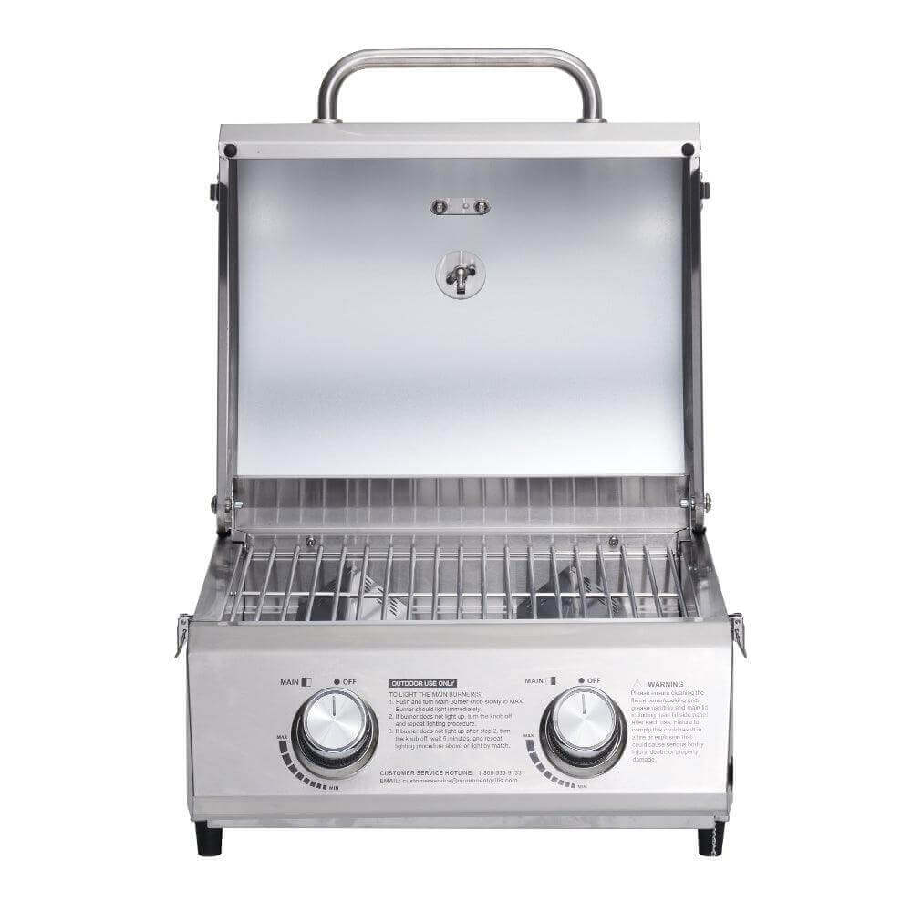 Tabletop stainless steel propane gas grill by Monument Grills with two control knobs on Tampa Home & Garden Store