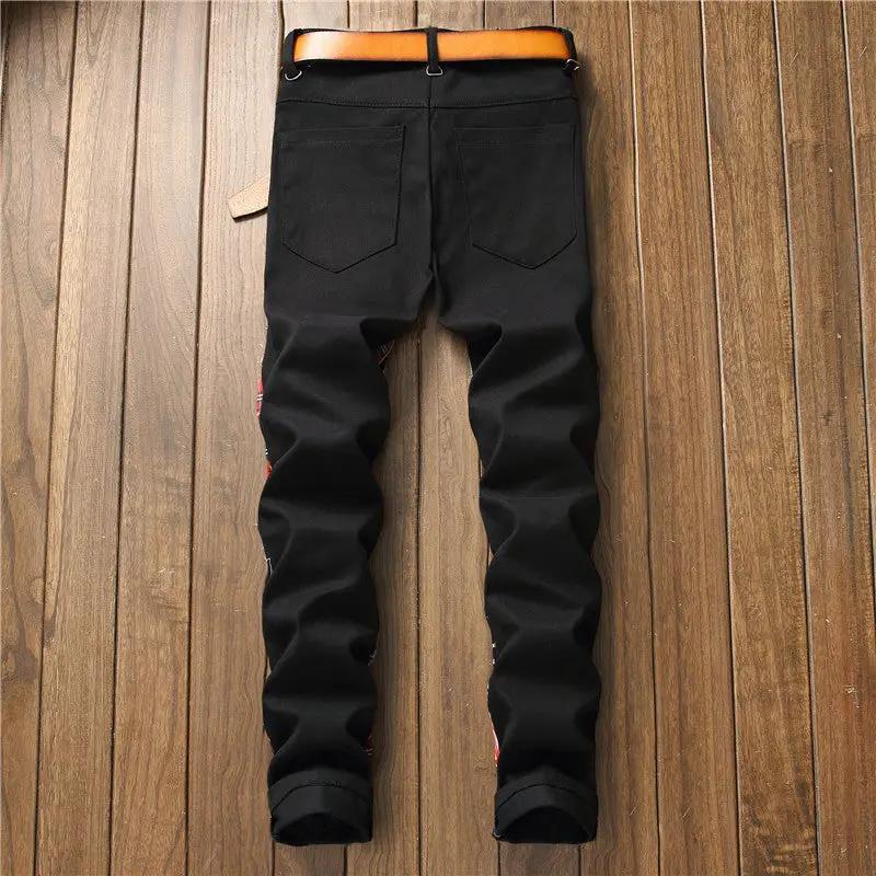 New men's ripped patch jeans in black denim with back pockets on Tampa Home & Garden Store