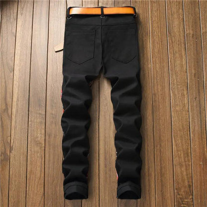 New men's ripped patch jeans in black denim with back pockets on Tampa Home & Garden Store