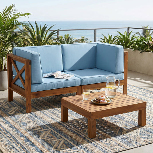 Brava X-Back 2-Seater sectional loveseat with coffee table, blue cushions, wooden frame outdoor patio set on Tampa Home & Garden Store