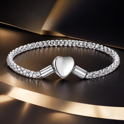 Sterling silver women's bracelet with heart-shaped 1.0cm centerpiece and beaded band, 17cm on Tampa Home & Garden Store