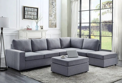 Cassia 7-seat reversible modular sectional sofa with ottoman in gray fabric, placed in a space on Tampa Home & Garden Store