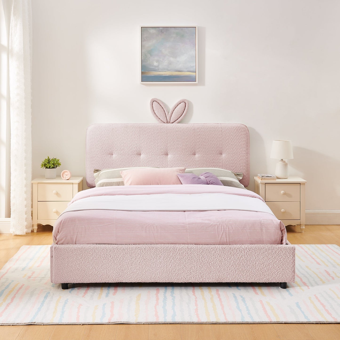 Queen Size Kids Upholstered Bed with Rabbit Ear Headboard in soft pink tufted fabric on Tampa Home & Garden Store