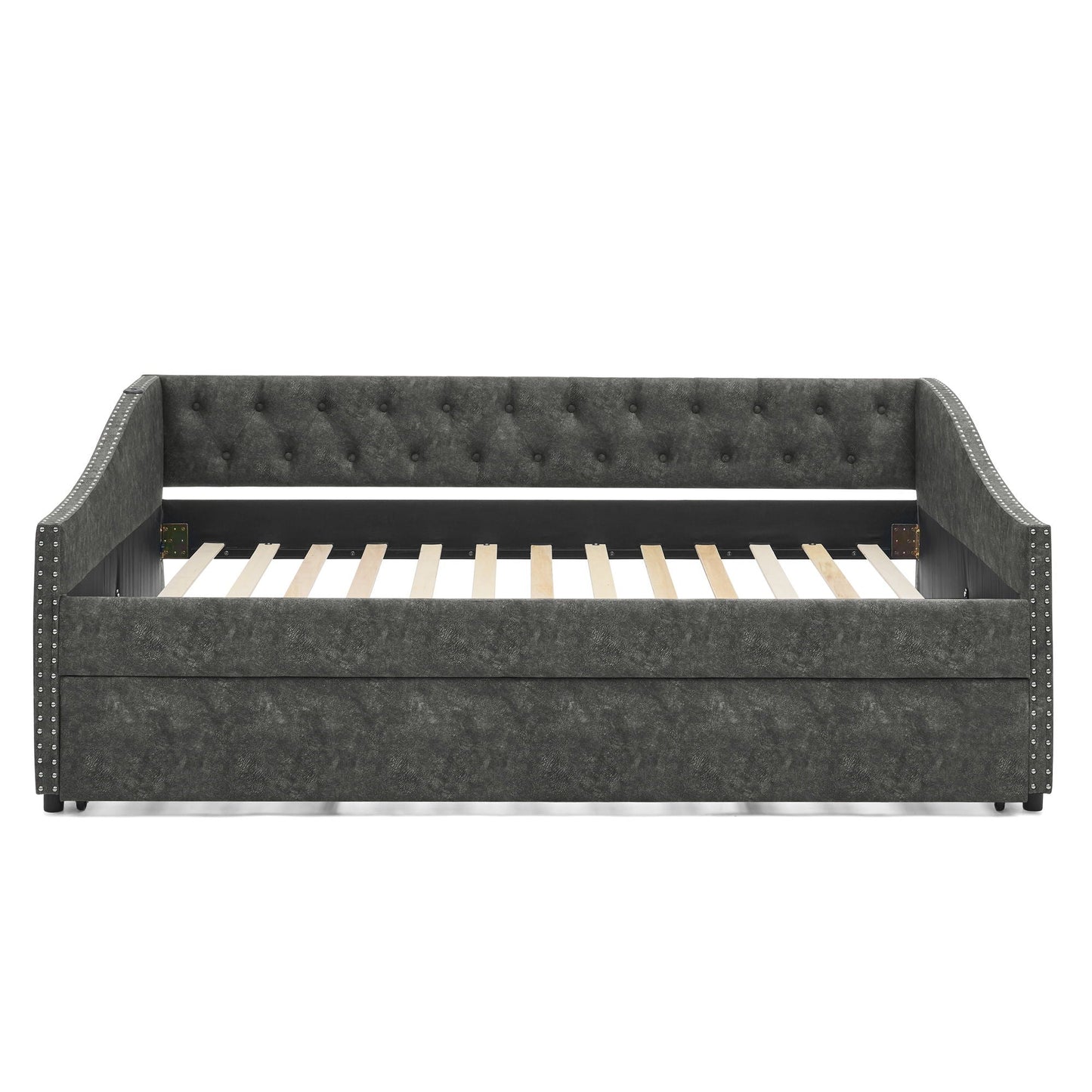 Upholstered daybed with pull-out trundle in dark gray fabric, tufted back and nailhead trim on Tampa Home & Garden Store