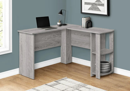Corner desk by Unique Piece Furniture gray wood finish with storage shelves and laptop on Tampa Home & Garden Store