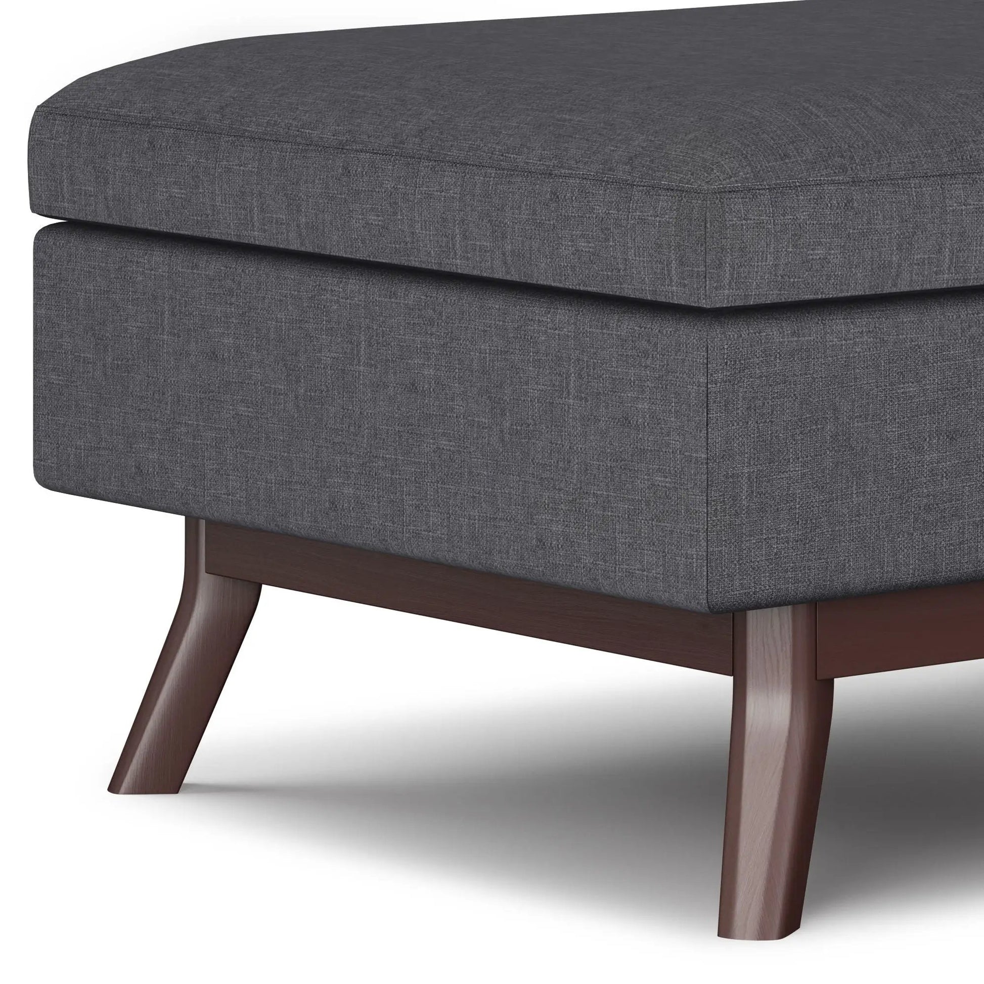 Owen Upholstered Rectangular Storage Ottoman in dark gray fabric with wooden legs on Tampa Home & Garden Store