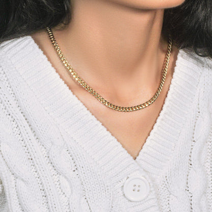 10k yellow gold Miami Cuban chain necklace 4.50 mm by Bids.com worn on model on Tampa Home & Garden Store