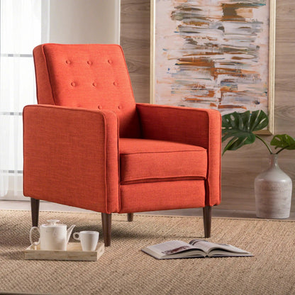 Mid-Century Modern recliner in burnt orange fabric with button tufting and dark wood legs on Tampa Home & Garden Store