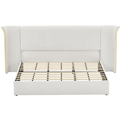 King size luxury wing-back upholstered bed frame with padded beige headboard and gold trim on Tampa Home & Garden Store