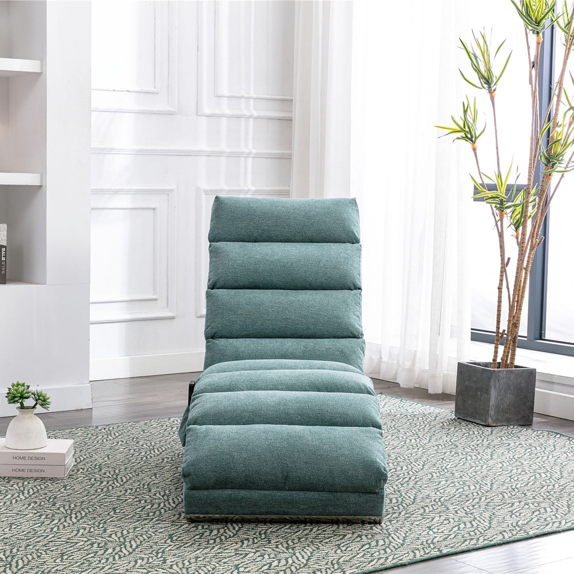Massage Chaise Lounge indoor teal upholstery with remote control in bright modern room on Tampa Home & Garden Store