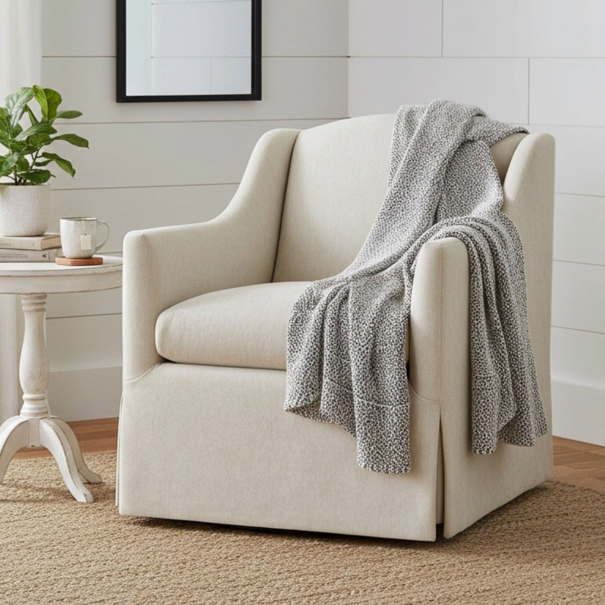 Skirted swivel accent chair in beige fabric with 360° swivel base on Tampa Home & Garden Store