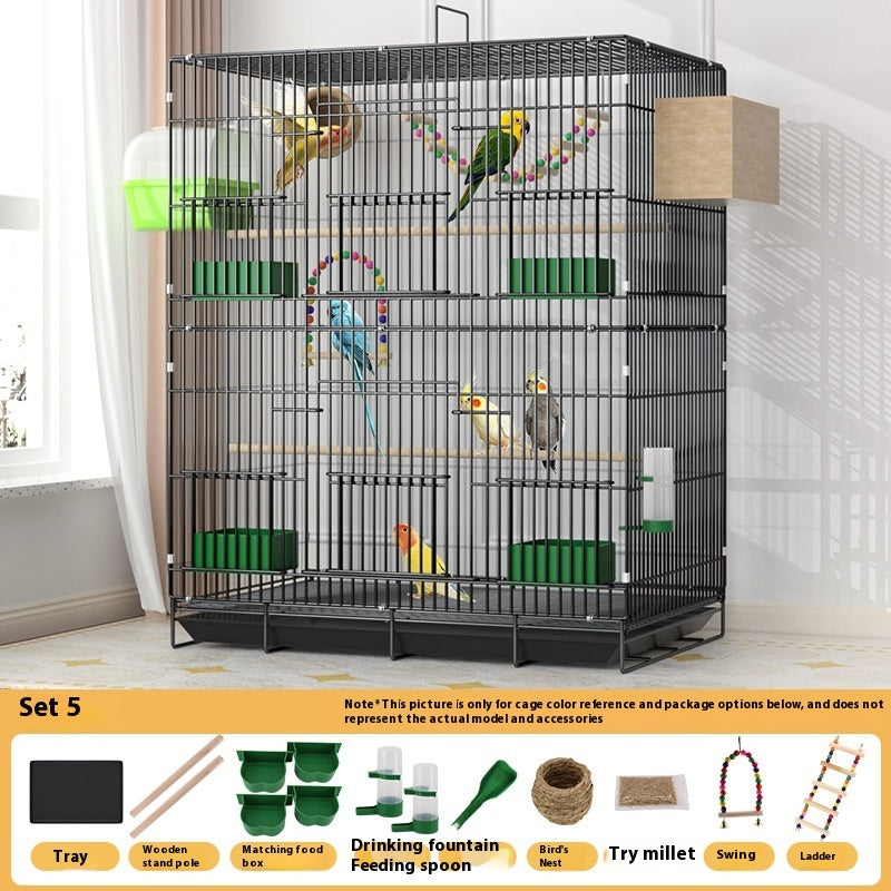 Double-layer bird cage in black metal with perches, green bowls and toys on Tampa Home & Garden Store