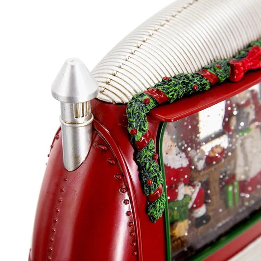 Red resin Christmas camper featuring Mr & Mrs Santa, LED water-spinning, 2-way switch on Tampa Home & Garden Store
