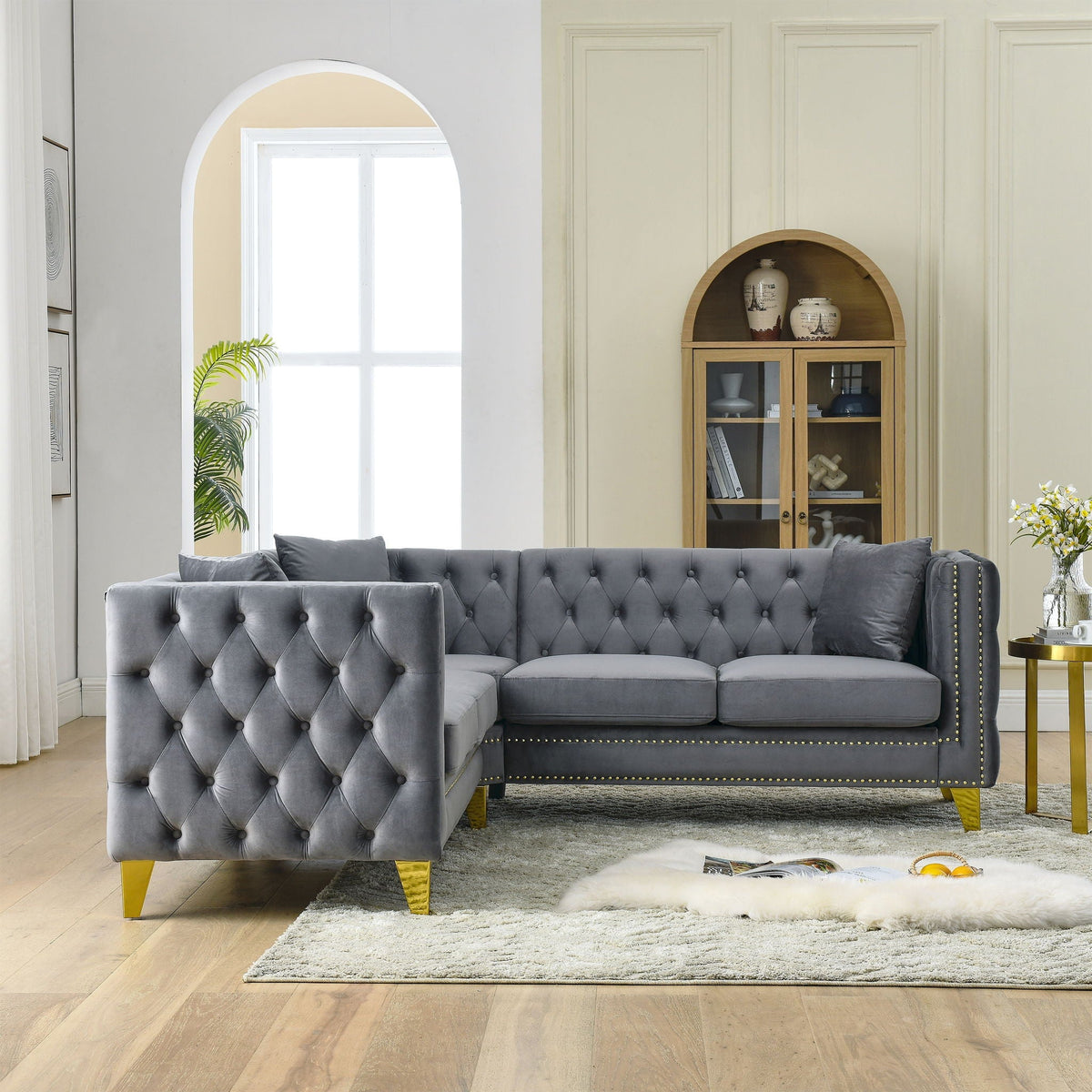 L-shaped 5-seater stationary corner sofa in gray velvet with tufted cushions and gold legs on Tampa Home & Garden Store