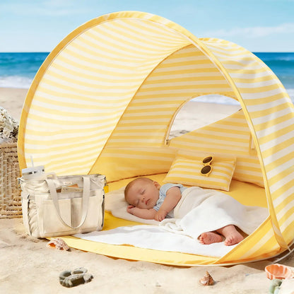 Tiny Land One-Stop Beach Toy & Tent Set yellow striped pop-up beach tent with baby napping on Tampa Home & Garden Store