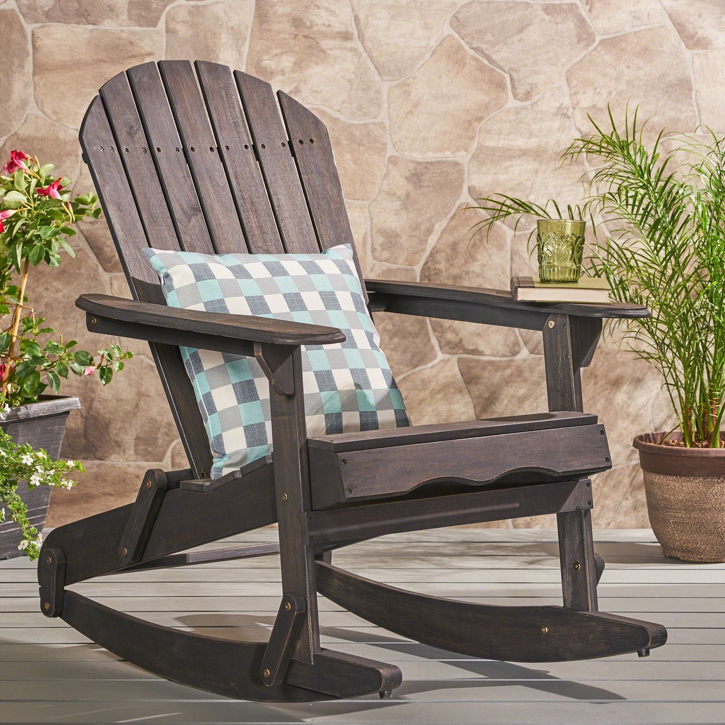 Outdoor Adirondack rocker in dark wood with teal cushion on Tampa Home & Garden Store