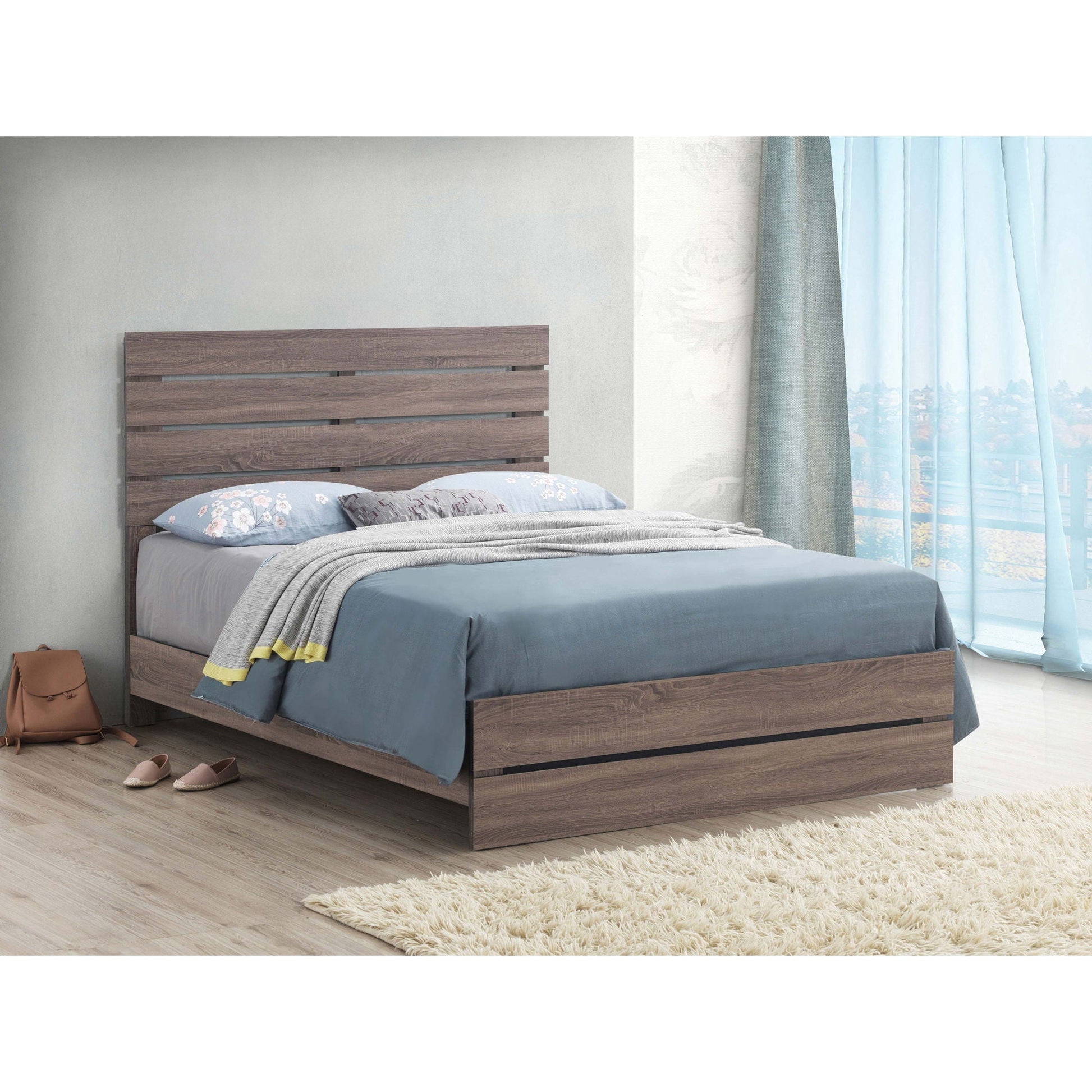 Geary Panel Bed by HouseOfZazla, walnut slatted headboard with low platform base, blue bedding on Tampa Home & Garden Store