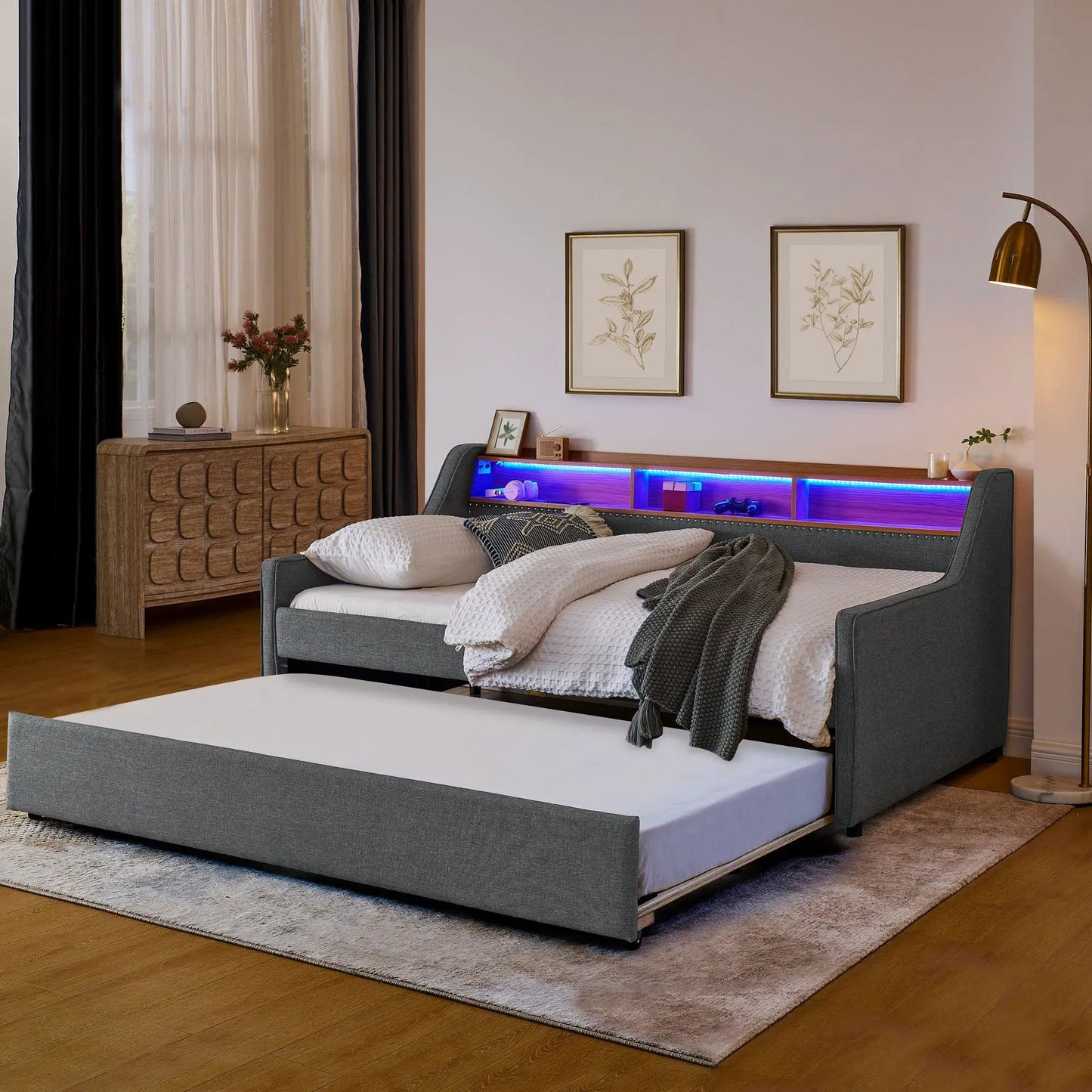 Upholstered gray sofa bed with built-in storage headboard and blue LED shelf lighting on Tampa Home & Garden Store