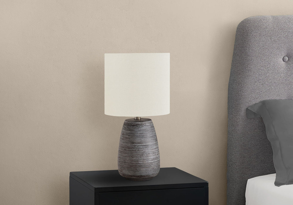 Contemporary ceramic table lamp gray and cream with textured base HouseOfZazla on nightstand on Tampa Home & Garden Store