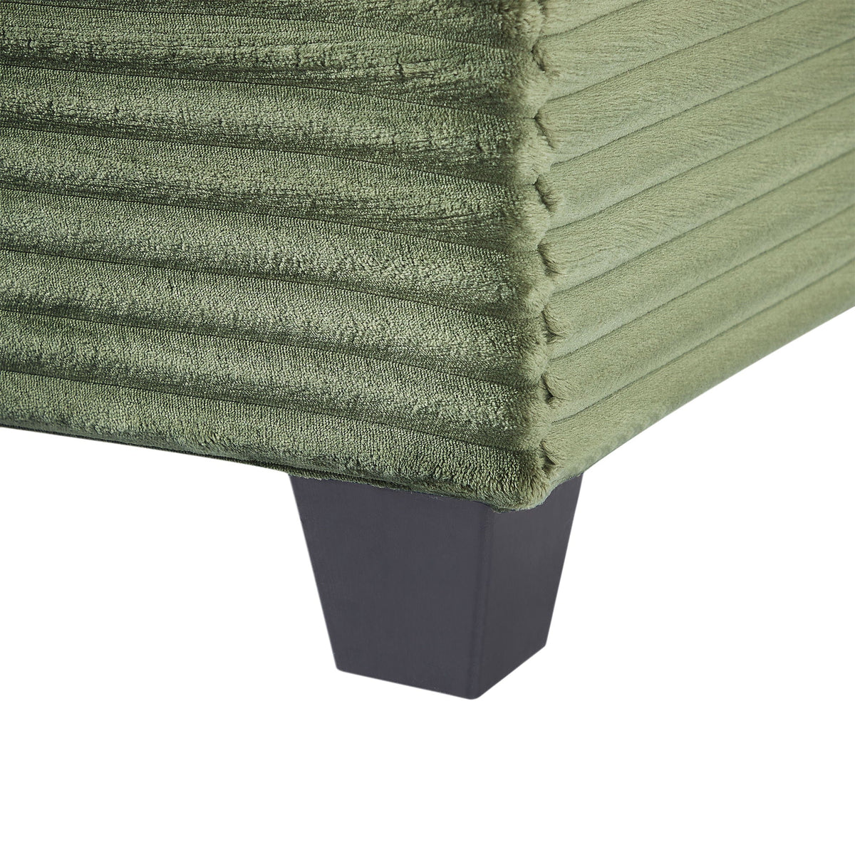 Upholstered olive green velvet U-shaped sectional sofa close-up with black tapered leg on Tampa Home & Garden Store