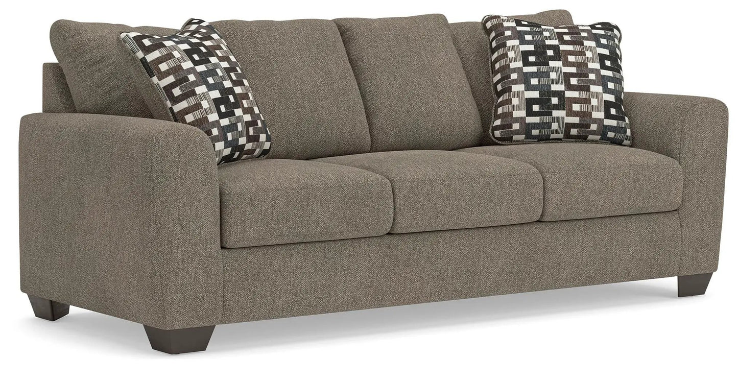 Triston-Peaks sofa in brown suede upholstery, 3-seat stationary with 2 patterned pillows on Tampa Home & Garden Store