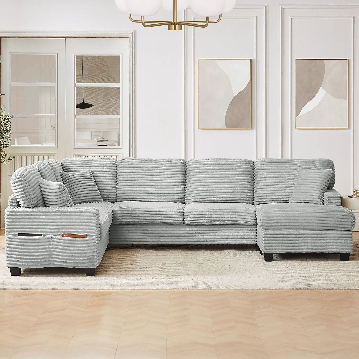 U-shaped sectional sofa with movable ottoman and side storage pockets in gray ribbed fabric on Tampa Home & Garden Store