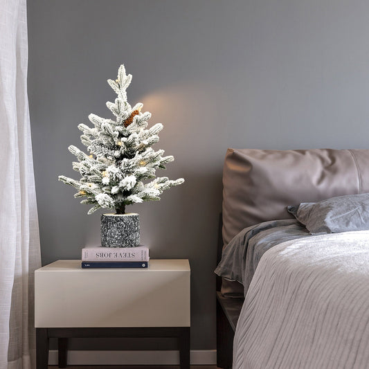 2FT Flocked Christmas Tree with Pot Base on a white nightstand on Tampa Home & Garden Store