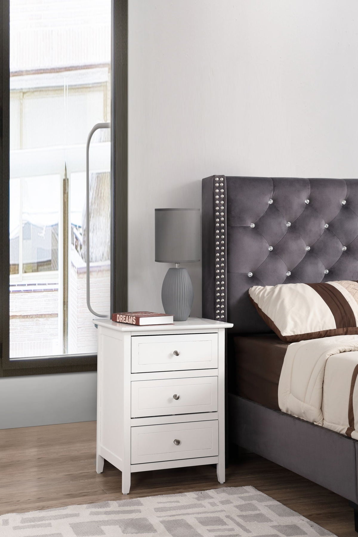 3 Drawer Nightstand in white wood veneer with metal knobs; lamp and book on top on Tampa Home & Garden Store