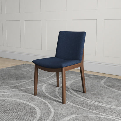 Mid-Century Modern solid wood dining chair with navy blue fabric upholstery and wooden legs on Tampa Home & Garden Store