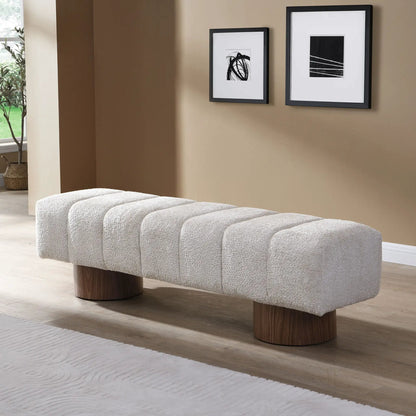 Three-segment upholstered dining bench in beige boucle with dark wood bases on Tampa Home & Garden Store