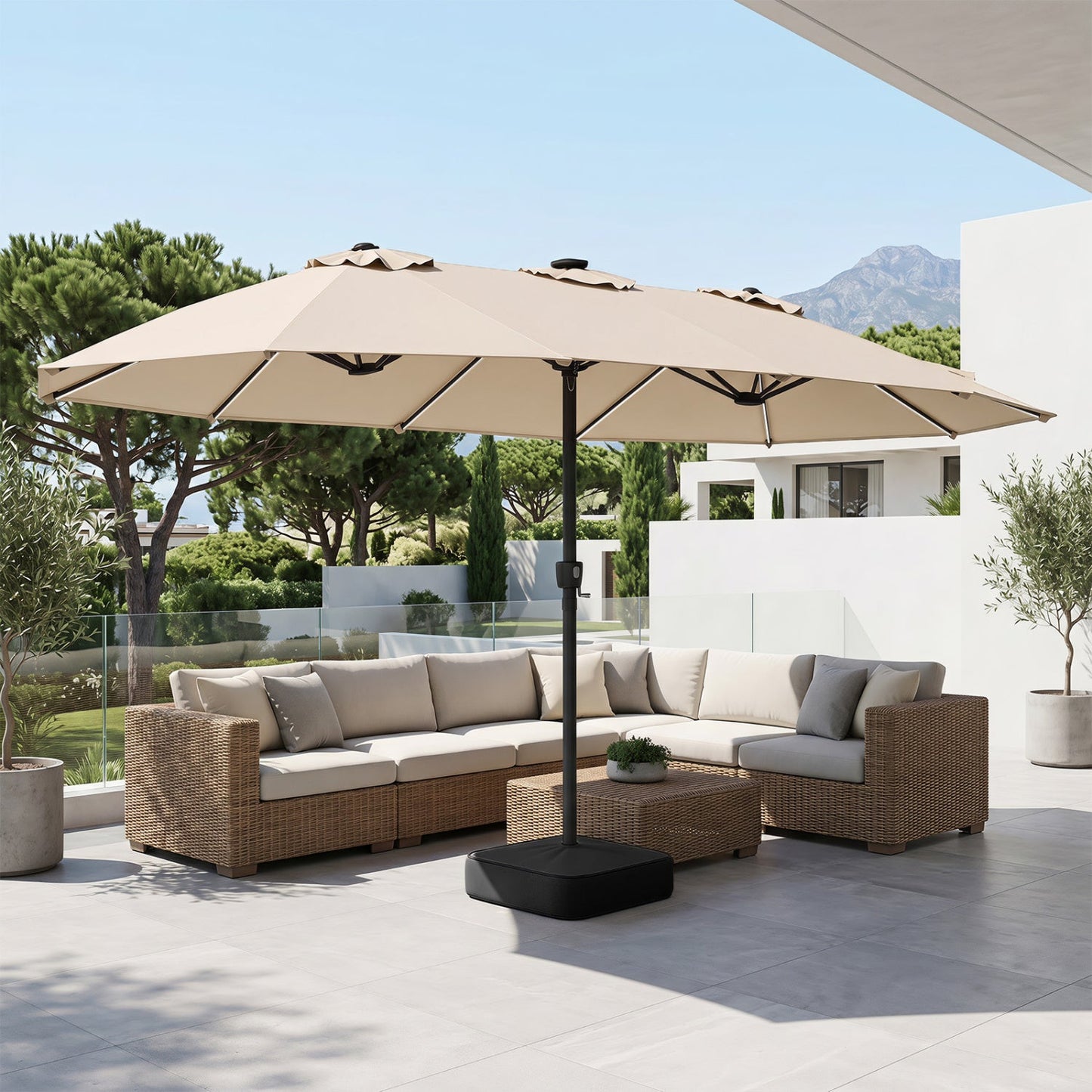 DirectDeals 15.5 ft patio umbrella with beige canopy, solar LED lights, and heavy black base on Tampa Home & Garden Store
