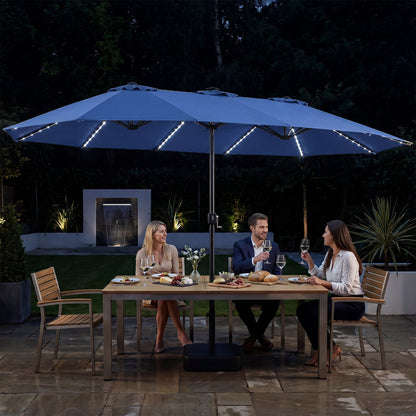 Patio umbrella DirectDeals blue 15.5 ft with solar LED lights and base on Tampa Home & Garden Store