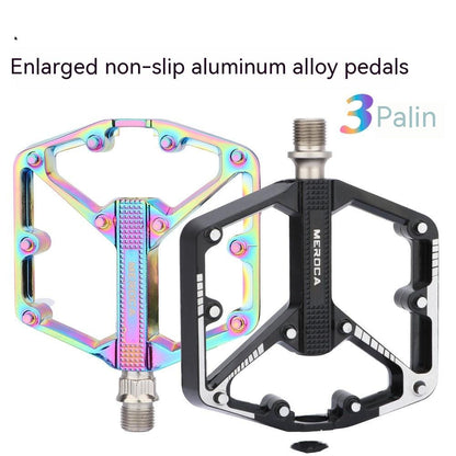 Pair of bicycle pedals: iridescent aluminum alloy flat pedal and black Meroda platform pedal on Tampa Home & Garden Store