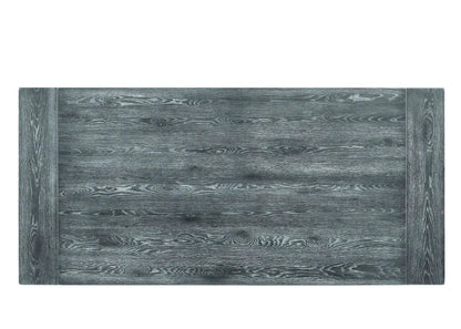 Leventis dining table weathered gray wood grain with chunky end legs on Tampa Home & Garden Store