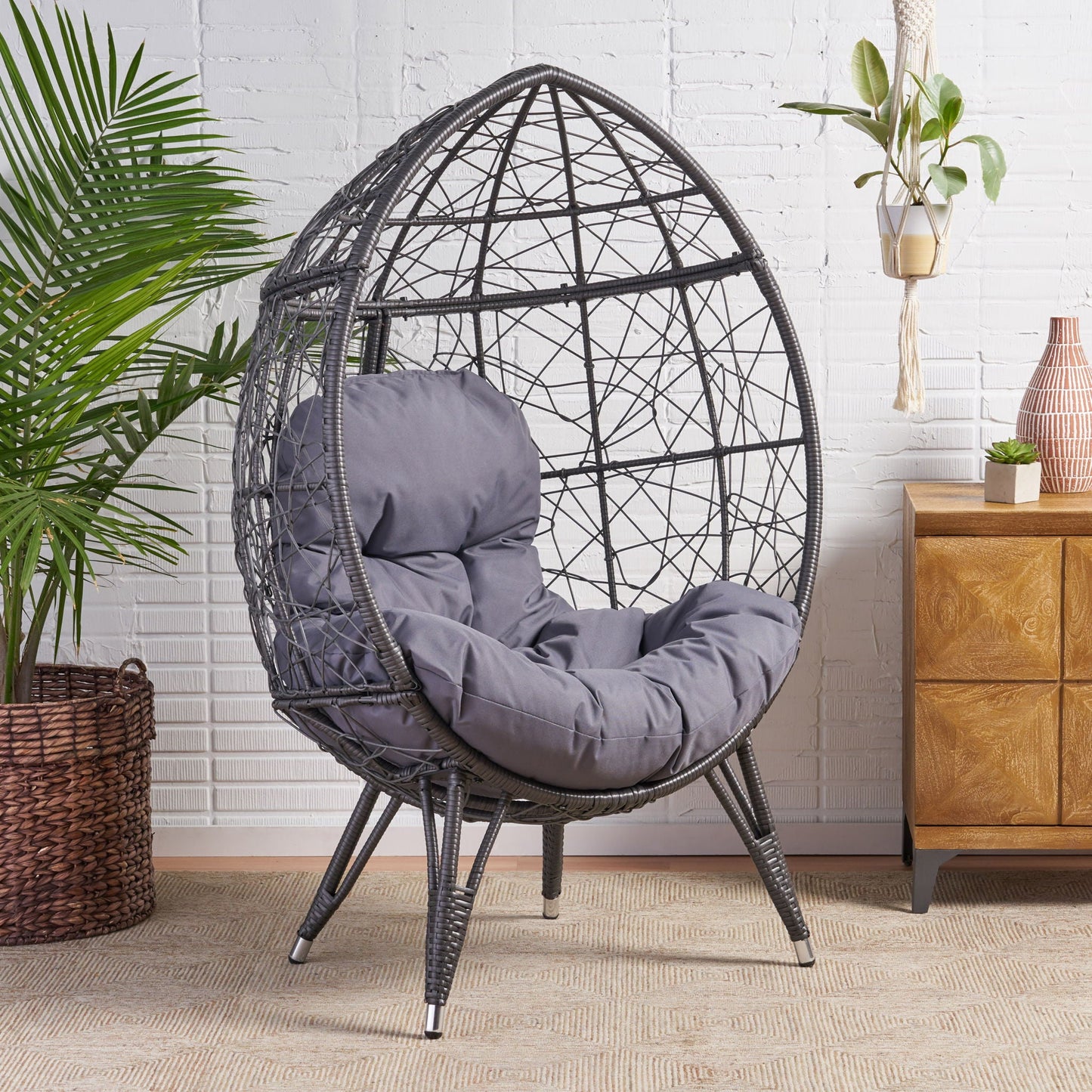 Cosmos Round Teardrop Chair, hammered iron, black accent by HouseOfZazla with gray cushions on Tampa Home & Garden Store