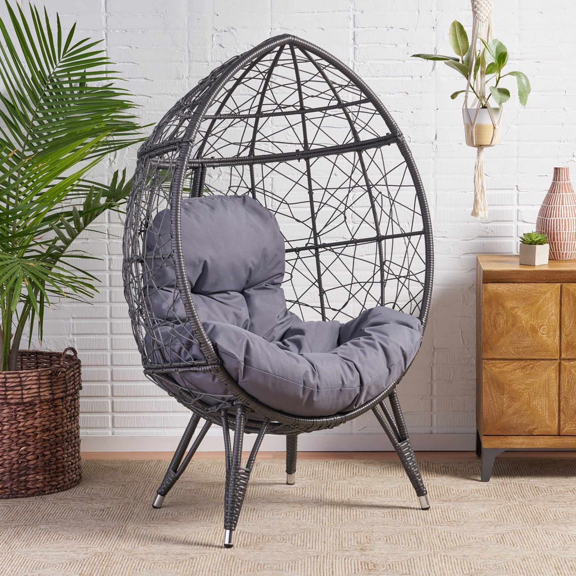 Cosmos Round Teardrop Chair, hammered iron, black accent by HouseOfZazla with gray cushions on Tampa Home & Garden Store